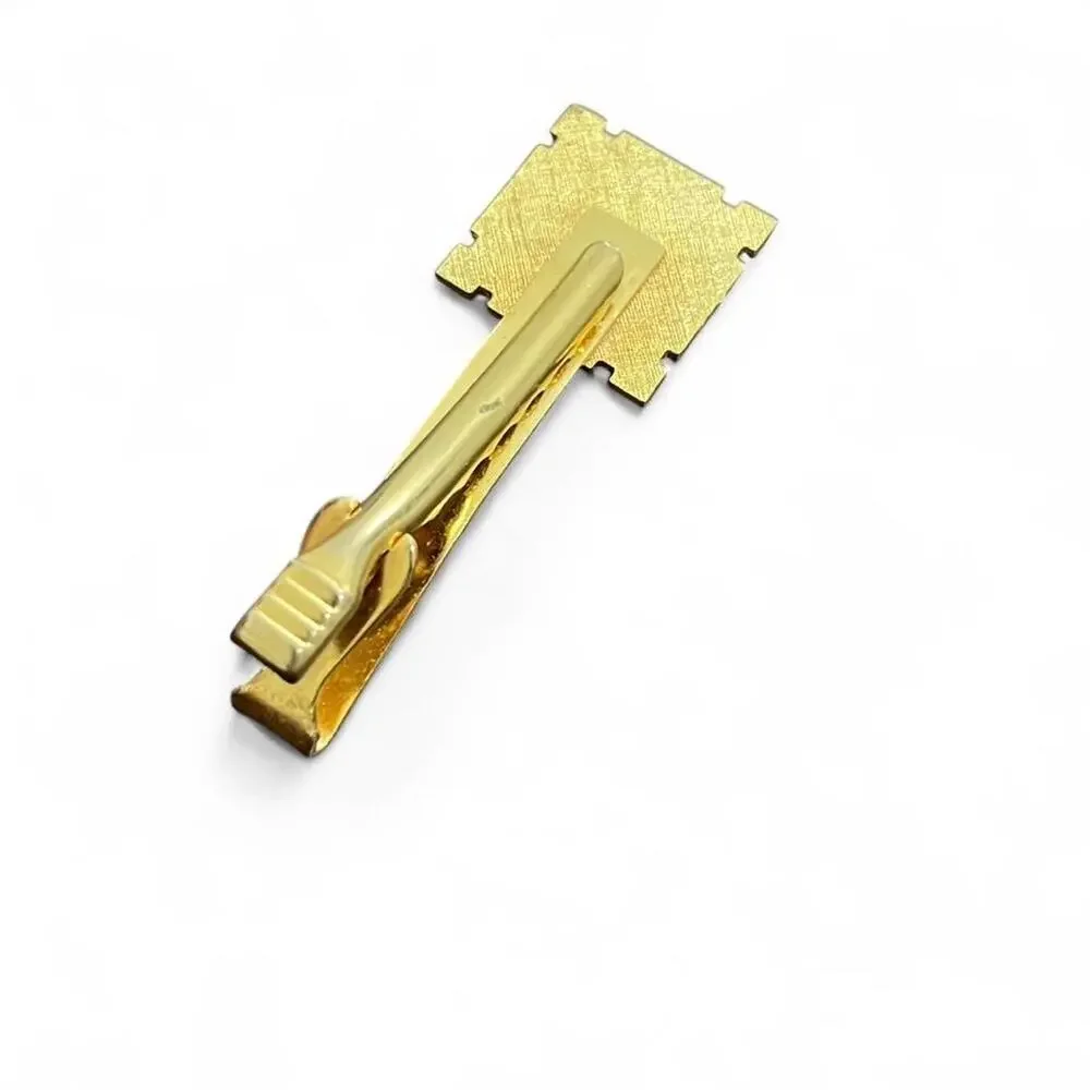 Gold tie clip with masonic